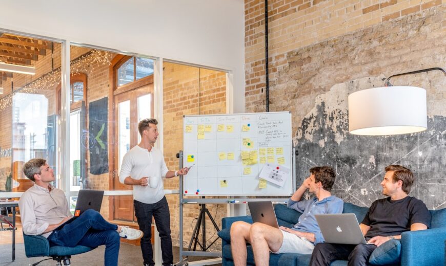 A group of professionals seated in a conference room streamlining communication and collaboration using relationship mapping tools